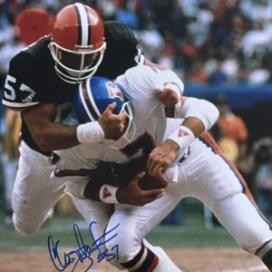Clay sacks Elway (autographed)